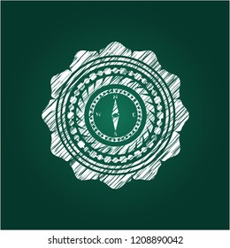 compass icon inside chalk emblem