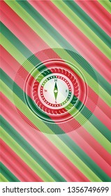 compass icon inside christmas colors style emblem.