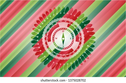 compass icon inside christmas style emblem.