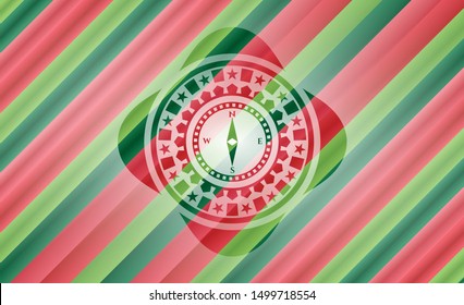 compass icon inside christmas style badge..