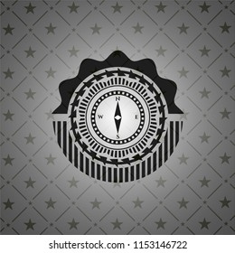 compass icon inside dark badge