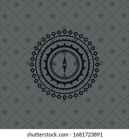 compass icon inside dark emblem