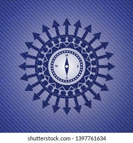 compass icon inside emblem with jean texture