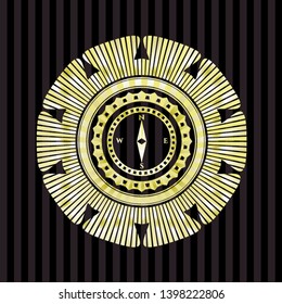 compass icon inside gold emblem