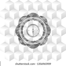 compass icon inside grey badge with geometric cube white background