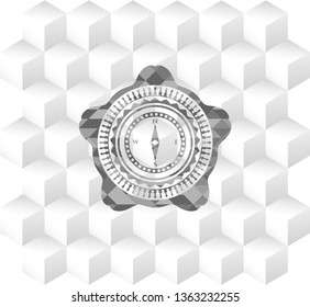 compass icon inside grey badge with geometric cube white background