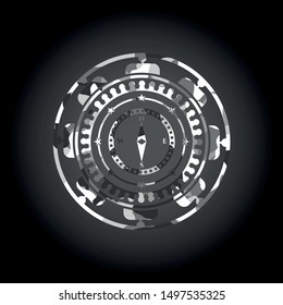compass icon inside grey camo emblem
