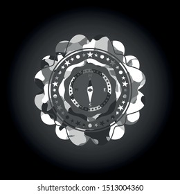 compass icon inside grey camo emblem