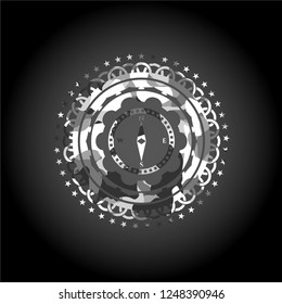 compass icon inside grey camouflage texture