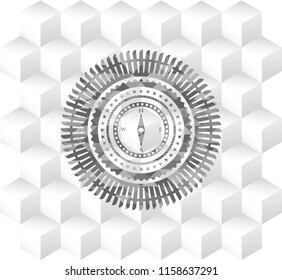 compass icon inside grey emblem with geometric cube white background