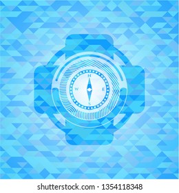compass icon inside light blue emblem with triangle mosaic background