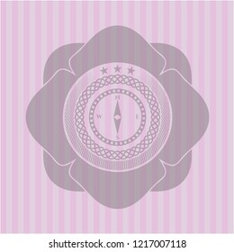 compass icon inside pink icon or emblem