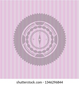 compass icon inside pink emblem. Vintage.