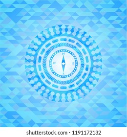 compass icon inside realistic sky blue mosaic emblem