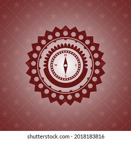 compass icon inside red icon or emblem. 