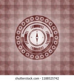 compass icon inside red geometric pattern emblem. Seamless.