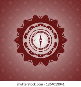 compass icon inside retro red emblem