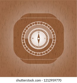 compass icon inside retro style wood emblem