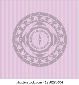 compass icon inside vintage pink emblem