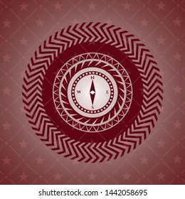 compass icon inside vintage red emblem