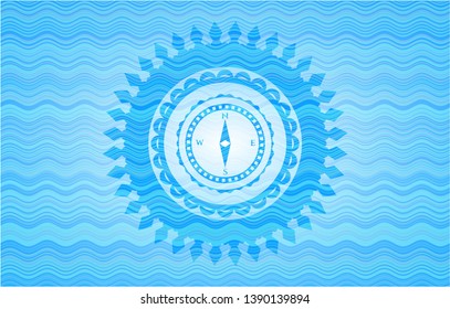 compass icon inside water representation style badge.