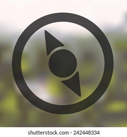 compass icon on blurred background