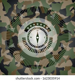 compass icon on camouflage texture