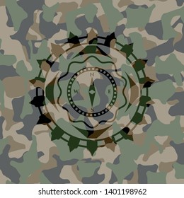 compass icon on camouflaged texture