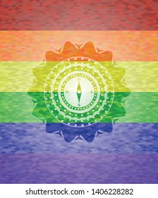 compass icon on mosaic background with the colors of the LGBT flag