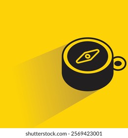 compass icon with shadow on yellow background