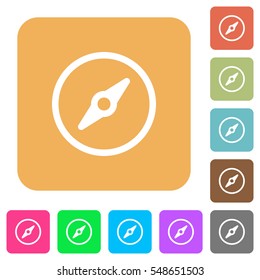 Compass icons on rounded square vivid color backgrounds.