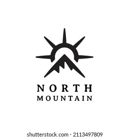 compass mountain logo. unique combination of compass and mountain or peak logo design.