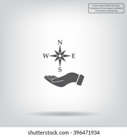 Compass on hand flat icon. Vector illustration EPS.