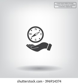 Compass on hand flat icon. Vector illustration EPS.