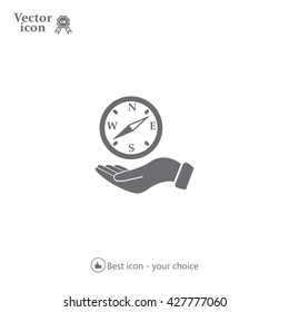 Compass on hand flat icon. Vector illustration EPS.