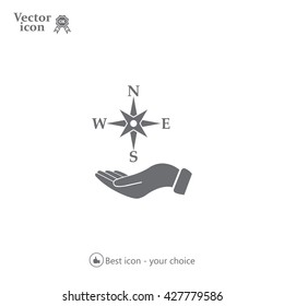 Compass on hand flat icon. Vector illustration EPS.