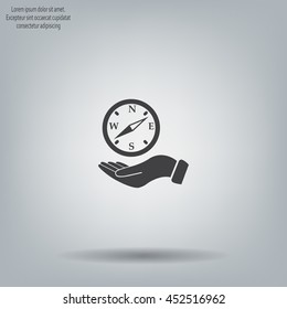 Compass on hand flat icon. Vector illustration EPS.