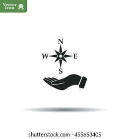 Compass on hand flat icon. Vector illustration EPS.