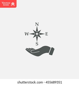 Compass on hand flat icon. Vector illustration EPS.