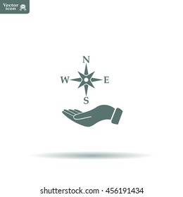 Compass on hand flat icon. Vector illustration EPS.
