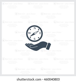 Compass on hand flat icon. Vector illustration EPS.