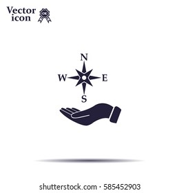 Compass on hand flat icon. Vector illustration EPS.