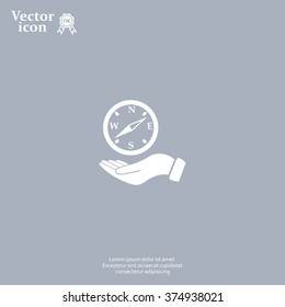 Compass on hand icon. Vector illustration EPS.