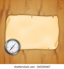 Compass on wood background. EPS10 vector