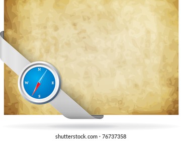 Compass over old paper background