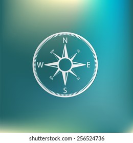 compass sign. colored button, icon orienteering, traveling or camping in the woods