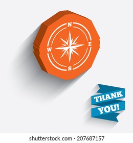 Compass sign icon. Windrose navigation symbol. White icon on orange 3D piece of wall. Carved in stone with long flat shadow. Vector