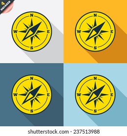 Compass sign icon. Windrose navigation symbol. Four squares. Colored Flat design buttons. Vector