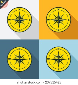 Compass sign icon. Windrose navigation symbol. Four squares. Colored Flat design buttons. Vector