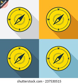 Compass sign icon. Windrose navigation symbol. Four squares. Colored Flat design buttons. Vector